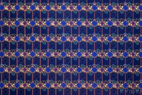 iFixit microscope photo at twenty times magnification showing the display's pixel pattern spanning the Face ID opening