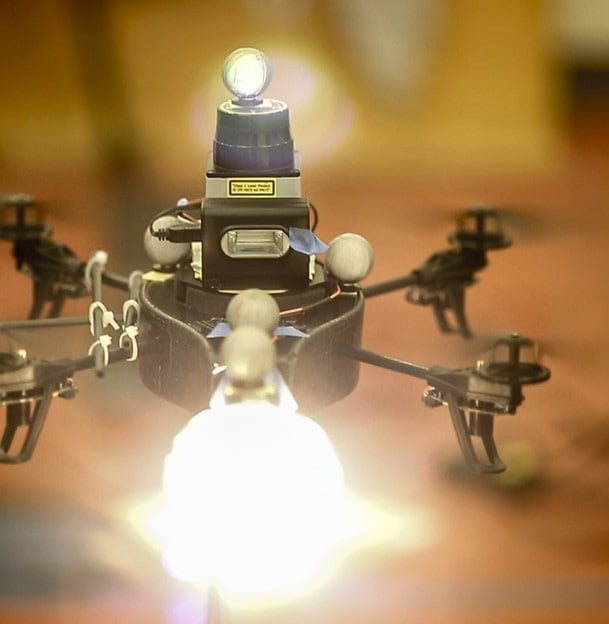 The litrobot quadrotor carrying a flash and continuous light